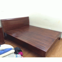 Giường gỗ xoan đào mới 95%